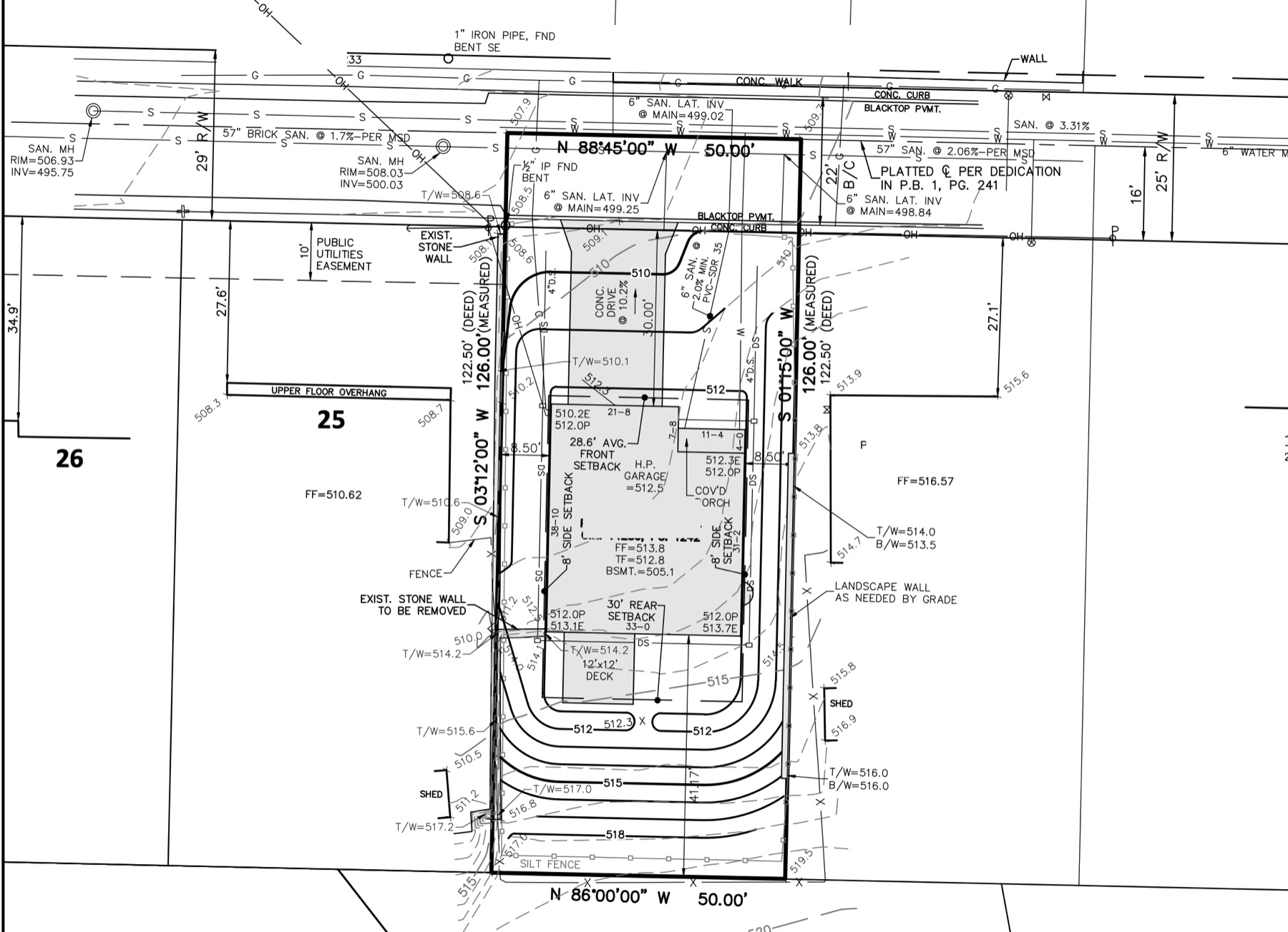 Plot plan showing the lot lines, house footprint, setbacks, grading contours and utility connections