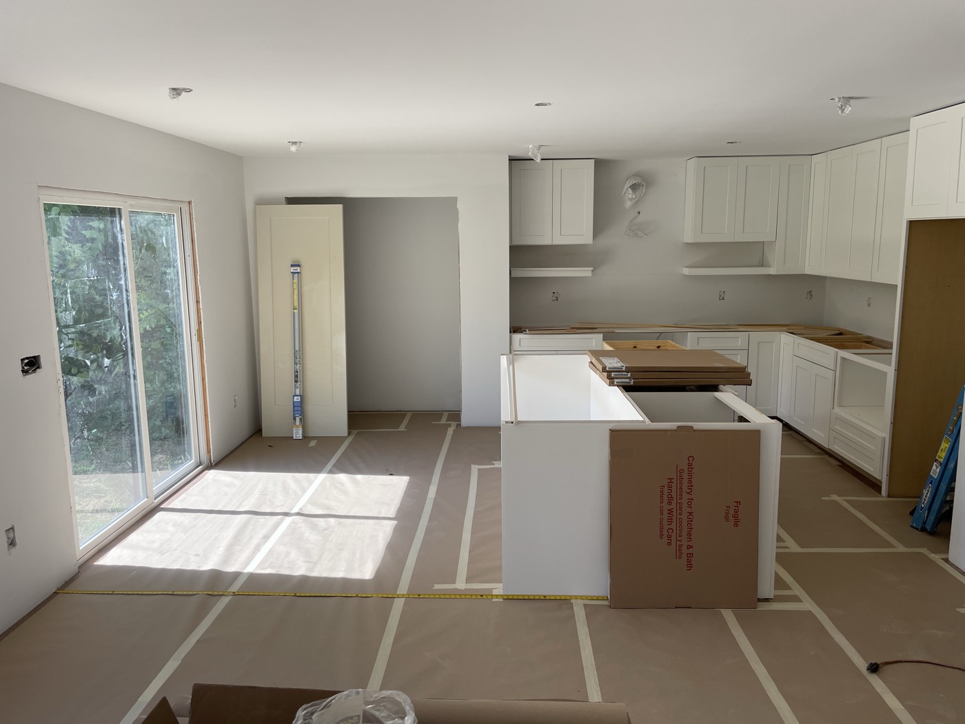 A new white kitchen with an island